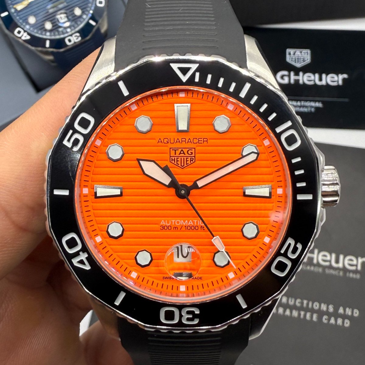 a43f4e_33f8607cbbce4389b026eba7eff7724cmv2 Tag Heuer Aquarecer 300, 43mm, Aço, Mostrador Laranja, Puls. Borracha - Imagem 1