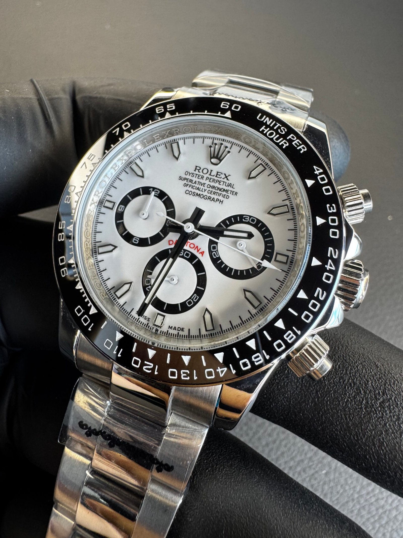 rolex-daytona-40mm-aco-mostrador-branco-luneta-preta-foto1 Rolex Daytona 40mm Aço Mostrador Branco Luneta Preta - Imagem 1