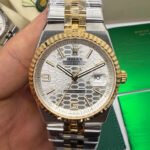 Rolex Oyster Perpetual Land‑Dweller 40mm Aço/Dourado, Mostrador Prata