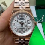 Rolex Oyster Perpetual Land‑Dweller 40mm Aço/Rose, Mostrador Prata
